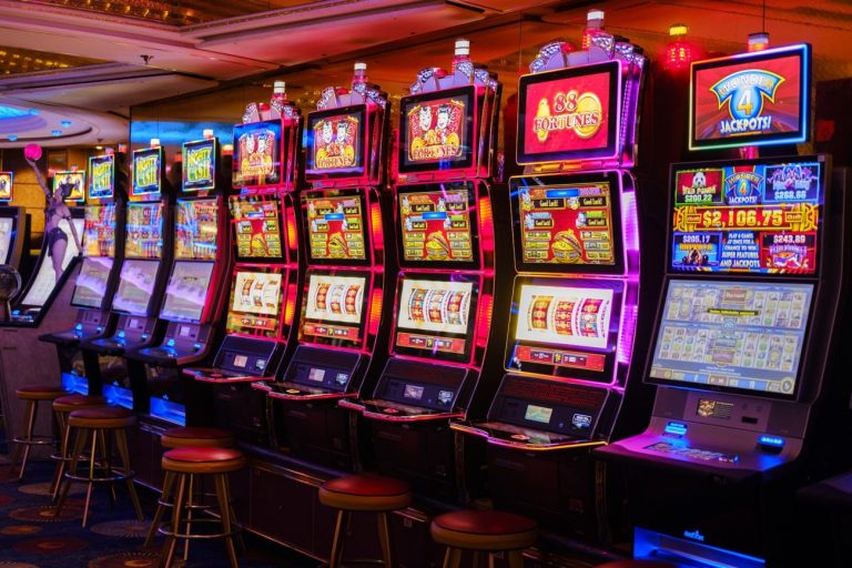 How do online casinos ensure fairness and transparency in their real money slot games, and what regulatory measures are in place to protect players?